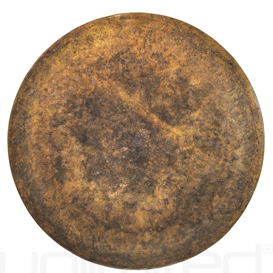 A weathered, rusted circular metal plate with a textured surface.